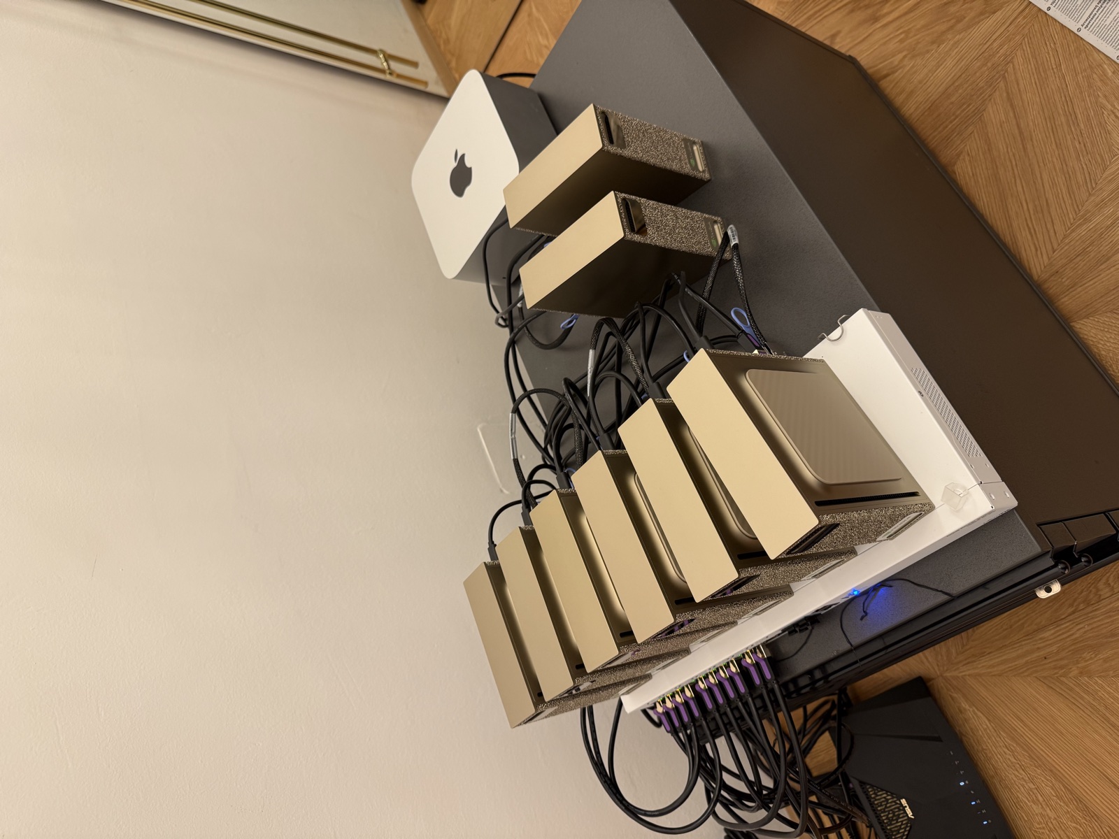 DGX Spark systems and networking equipment on the lab desk.
